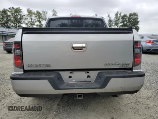 2014 Honda Ridgeline Sport with VIN 5FPYK1F7XEB011983, listed as a Copart auction lot 64146835 with 121,345 mi miles and Salvage title. Bid and sale history available at DreamBid. Image 6.