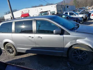 2016 Dodge Grand Caravan SE with VIN 2C4RDGBGXGR217926, listed as a IAAI auction lot 41631102 with 89,027 mi miles and . Bid and sale history available at DreamBid. Image 13.