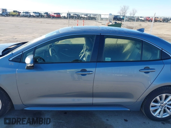 2023 Toyota Corolla Hybrid LE with VIN JTDBCMFEXPJ014034, listed as a IAAI auction lot 41865829 with 33,210 mi miles and . Bid and sale history available at carsss.com. Image 15.