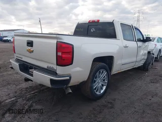 2014 Chevrolet Silverado 1500 High Country with VIN 3GCUKTEC5EG407573, listed as a IAAI auction lot 41651363 with 136,239 mi miles. Bid and sale history available at carsss.com. Image 4.