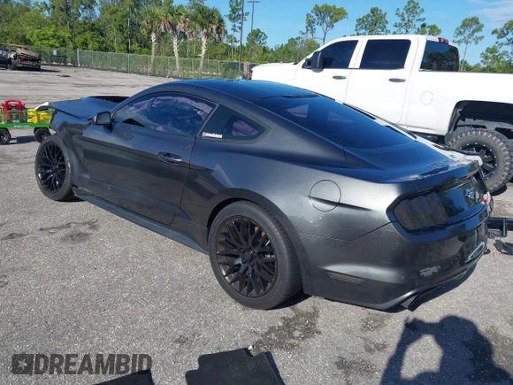2017 Ford Mustang EcoBoost z VIN 1FA6P8TH5H5287023, wystawiony jako IAAI lot #42600833 z przebiegiem 103 685 mil mil oraz . Historia ofert i sprzedaży dostępna na DreamBid. Obrazek 3.