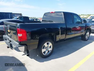 2011 Chevrolet Silverado 1500 LT with VIN 1GCRCSE05BZ408348, listed as a IAAI auction lot 42150412 with 300,795 mi miles and . Bid and sale history available at DreamBid. Image 4.