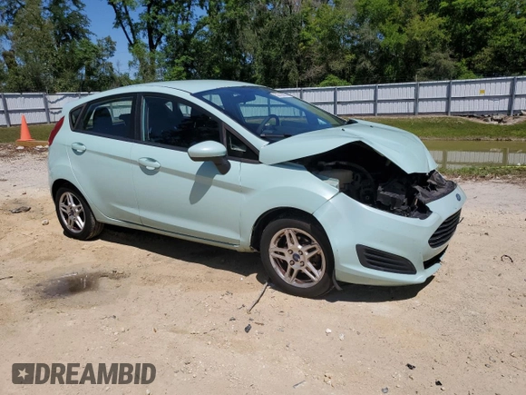 2017 Ford Fiesta SE with VIN 3FADP4EJ0HM126301, listed as a Copart auction lot 52218865 with 80,598 mi miles and Salvage Title. Bid and sale history available at DreamBid. Image 4.