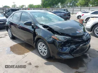 2019 Toyota Corolla L z VIN 5YFBURHE7KP905555, wystawiony jako IAAI lot #41943232 z przebiegiem 83 213 mil mil oraz . Historia ofert i sprzedaży dostępna na DreamBid. Obrazek 1.