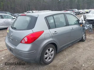 2009 Nissan Versa S with VIN 3N1BC13E59L407294, listed as a IAAI auction lot 41692951 with 250,029 mi miles and . Bid and sale history available at DreamBid. Image 4.