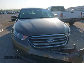 2015 Ford Taurus SEL z VIN 1FAHP2E84FG125243, wystawiony jako IAAI lot #42045847 z przebiegiem 42 093 mil mil oraz . Historia ofert i sprzedaży dostępna na DreamBid. Obrazek 12.