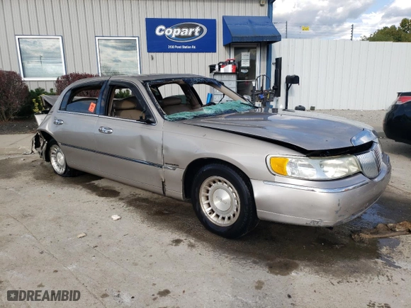 2002 Lincoln Town Car Executive with VIN 1LNHM81W32Y663460, listed as a Copart auction lot 72064874 with 153,251 mi miles and Salvage Title. Bid and sale history available at carsss.com. Image 4.