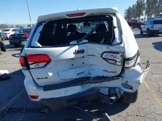 2017 Jeep Grand Cherokee Trailhawk with VIN 1C4RJFLGXHC959092, listed as a IAAI auction lot 41232281 with 108,659 mi miles and . Bid and sale history available at DreamBid. Image 16.