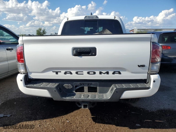 2020 Toyota Tacoma 4WD SR5 with VIN 3TMCZ5AN4LM312592, listed as a Copart auction lot 71634604 with 65,111 mi miles and Salvage Title. Bid and sale history available at carsss.com. Image 6.