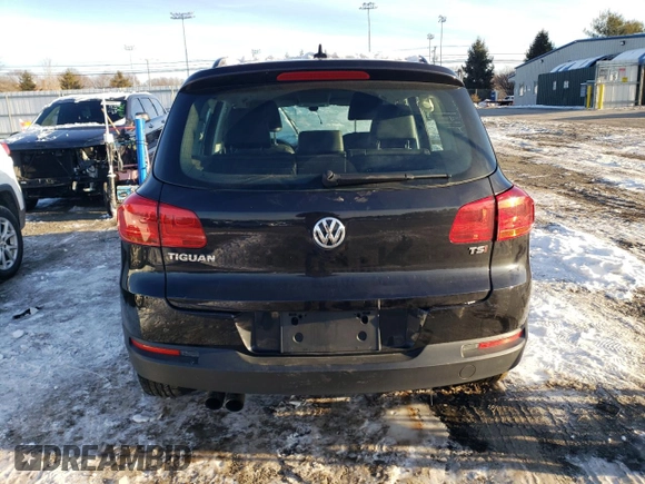 2017 Volkswagen Tiguan S with VIN WVGAV7AX8HK028148, listed as a Copart auction lot 86756104 with 84,060 mi miles and Salvage Title. Bid and sale history available at DreamBid. Image 6.