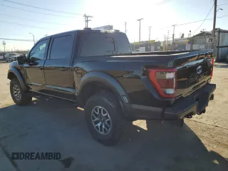 2021 Ford F-150 Raptor with VIN 1FTFW1RG3MFC62242, listed as a Copart auction lot 85596594 with 33,497 mi miles and Salvage Title. Bid and sale history available at carsss.com. Image 2.