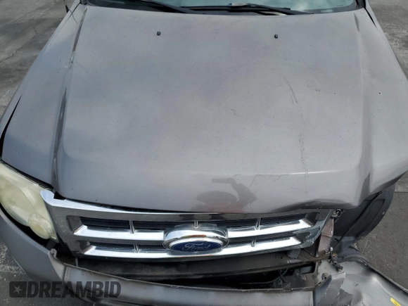 2010 Ford Escape Limited с VIN 1FMCU0EG8AKD06419, выставлен на аукционе Copart как лот 62357115 с пробегом 138 687 миль миль и Списание • Salvage title. История ставок и продаж доступна на DreamBid. Изображение 11.