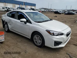 2017 Subaru Impreza Premium with VIN 4S3GKAB62H3612677, listed as a Copart auction lot 53604665 with 127,734 mi miles and Salvage title. Bid and sale history available at DreamBid. Image 4.