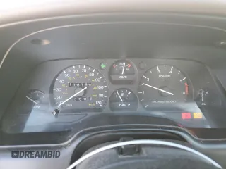 1994 Ford Thunderbird LX with VIN 1FALP62WXRH217279, listed as a Copart auction lot 80512504 with 176,798 mi miles and Salvage Title. Bid and sale history available at DreamBid. Image 9.