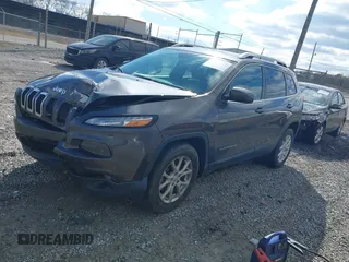 2018 Jeep Cherokee Latitude Plus with VIN 1C4PJLLXXJD606504, listed as a IAAI auction lot 41731085 with 95,569 mi miles. Bid and sale history available at carsss.com. Image 17.