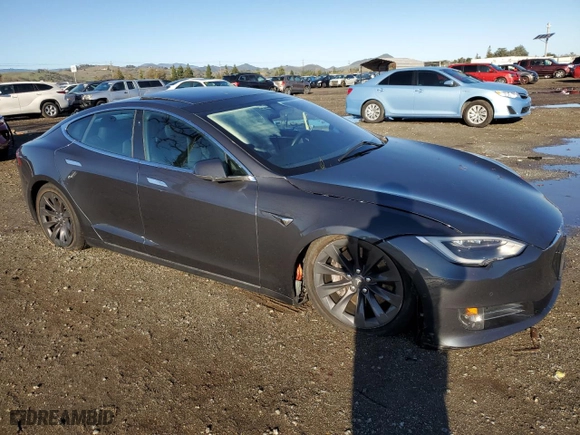 2017 Tesla Model S 100D with VIN 5YJSA1E22HF217374, listed as a Copart auction lot 43769145 with 80,069 mi miles and Salvage Title. Bid and sale history available at carsss.com. Image 4.