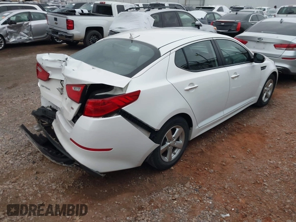 2015 Kia Optima LX with VIN KNAGM4A74F5587415, listed as a IAAI auction lot 41184428 with 128,549 mi miles. Bid and sale history available at carsss.com. Image 4.