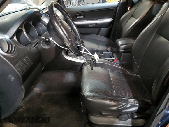 2012 Suzuki Grand Vitara Limited z VIN JS3TD0D77C4101382, wystawiony jako Copart lot #60017895 z przebiegiem 118 024 mil mil oraz Szkoda całkowita • Salvage title. Historia ofert i sprzedaży dostępna na DreamBid. Obrazek 7.