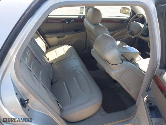 2001 Cadillac DeVille with VIN 1G6KD54Y91U235374, listed as a IAAI auction lot 41874980 with 136,090 mi miles. Bid and sale history available at carsss.com. Image 8.