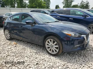 2017 Mazda 3 Touring z VIN 3MZBN1L72HM136418, wystawiony jako Copart lot #59851495 z przebiegiem 161 938 mil mil oraz Czysty tytuł • Clean title. Historia ofert i sprzedaży dostępna na DreamBid. Obrazek 4.