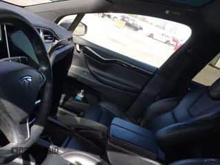 2016 Tesla Model X 70D with VIN 5YJXCAE26GF027267, listed as a IAAI auction lot 41915898 with Not Provided miles and . Bid and sale history available at DreamBid. Image 16.