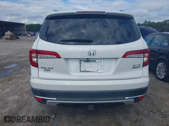 2020 Honda Pilot Elite with VIN 5FNYF6H08LB014288, listed as a IAAI auction lot 40496871 with 57,921 mi miles and . Bid and sale history available at DreamBid. Image 16.