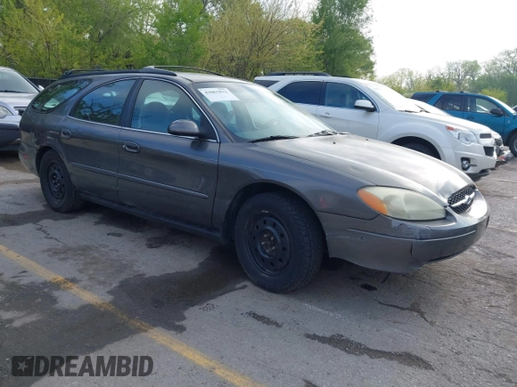 2003 Ford Taurus SE Standard with VIN 1FAFP58U63G117125, listed as a IAAI auction lot 42061812 with 172,154 mi miles. Bid and sale history available at carsss.com. Image 1.