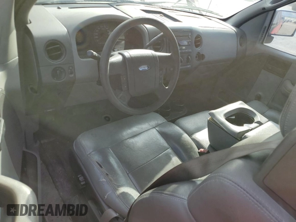 2005 Ford F-150 XL with VIN 1FTRF14W05NB33328, listed as a Copart auction lot 51165025 with 166,137 mi miles and Salvage Title. Bid and sale history available at carsss.com. Image 8.
