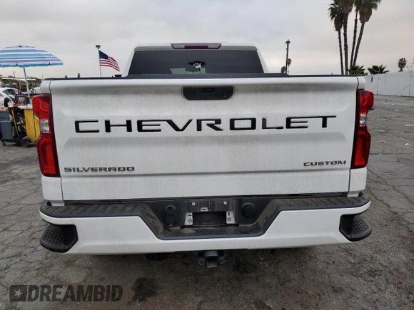 2021 Chevrolet Silverado 1500 Custom with VIN 1GCRWBEH9MZ122437, listed as a Copart auction lot 86158574 with 31,865 mi miles and Salvage Title. Bid and sale history available at DreamBid. Image 6.