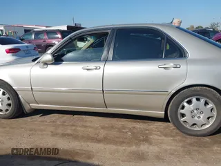 2004 Acura RL w/Navigation System with VIN JH4KA96674C007830, listed as a IAAI auction lot 41146234 with 80,611 mi miles. Bid and sale history available at carsss.com. Image 14.