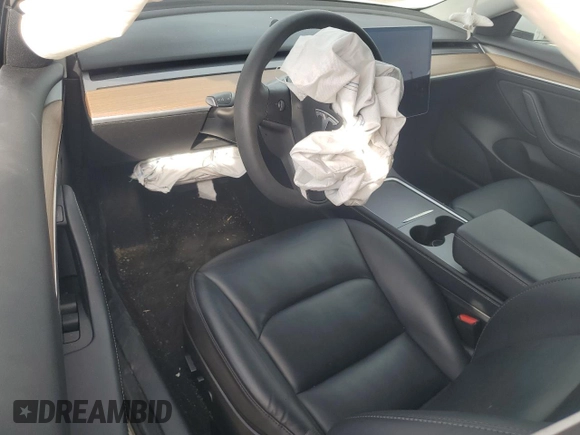 2021 Tesla Model 3 Standard Range Plus with VIN 5YJ3E1EA6MF048261, listed as a Copart auction lot 48680315 with Not Provided miles and Salvage Title. Bid and sale history available at DreamBid. Image 8.