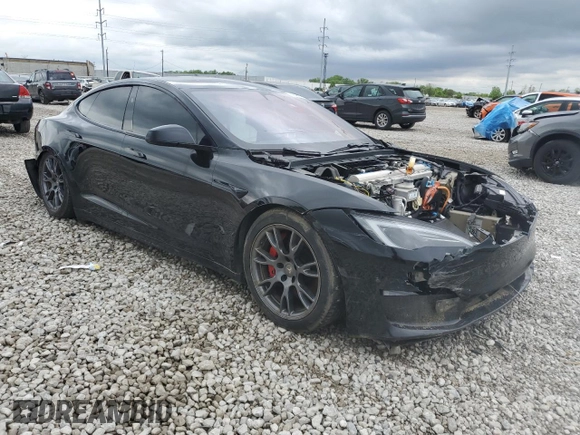 2023 Tesla Model S Plaid with VIN 5YJSA1E67PF511354, listed as a Copart auction lot 56648975 with 69,002 mi miles and Salvage title. Bid and sale history available at DreamBid. Image 4.