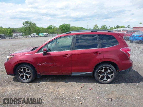 2014 Subaru Forester XT Touring with VIN JF2SJGMC1EH500150, listed as a IAAI auction lot 42201409 with 106,728 mi miles and . Bid and sale history available at DreamBid. Image 14.