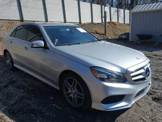 2014 Mercedes-Benz E-Class E 350 Luxury with VIN WDDHF8JB2EA891237, listed as a IAAI auction lot 41725010 with 115,429 mi miles. Bid and sale history available at carsss.com. Image 1.