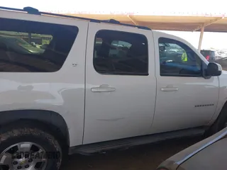 2012 Chevrolet Suburban LT with VIN 1GNSKJE70CR295137, listed as a IAAI auction lot 42112072 with 291,912 mi miles and . Bid and sale history available at DreamBid. Image 13.