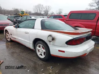 1998 Pontiac Firebird with VIN 2G2FS22KXW2207523, listed as a IAAI auction lot 41714591 with 151,321 mi miles. Bid and sale history available at carsss.com. Image 3.