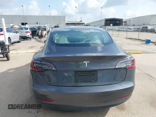 2023 Tesla Model 3 with VIN 5YJ3E1EA7PF567906, listed as a IAAI auction lot 42280993 with 41,452 mi miles and . Bid and sale history available at DreamBid. Image 17.
