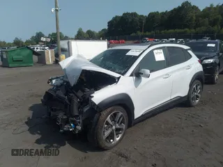 2021 Hyundai Kona Ultimate with VIN KM8K5CA57MU610302, listed as a IAAI auction lot 36878990 with 5,985 mi miles. Bid and sale history available at carsss.com. Image 2.