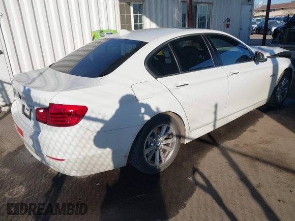 2015 BMW 5 Series 528i with VIN WBA5A5C5XFD520132, listed as a IAAI auction lot 41433751 with 76,576 mi miles and . Bid and sale history available at DreamBid. Image 4.