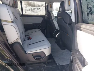 2024 Rivian R1S Adventure with VIN 7PDSGBBA9RN042780, listed as a IAAI auction lot 41440424 with 10,747 mi miles. Bid and sale history available at carsss.com. Image 8.