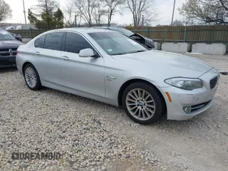 2011 BMW 5 Series 535i xDrive with VIN WBAFU7C59BC879124, listed as a IAAI auction lot 42062826 with 116,761 mi miles. Bid and sale history available at carsss.com. Image 1.