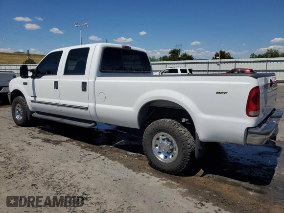 2000 Ford F-350 XL with VIN 3FTSW31F9YMA56877, listed as a Copart auction lot 62733624 with 120,595 mi miles and Salvage Title. Bid and sale history available at DreamBid. Image 2.