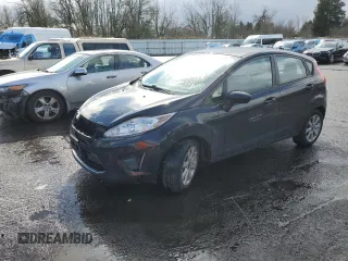 2012 Ford Fiesta SE z VIN 3FADP4EJ4CM183237, wystawiony jako Copart lot #48825605 z przebiegiem 92 798 mil mil oraz Szkoda całkowita • Salvage title. Historia ofert i sprzedaży dostępna na DreamBid. Obrazek 1.