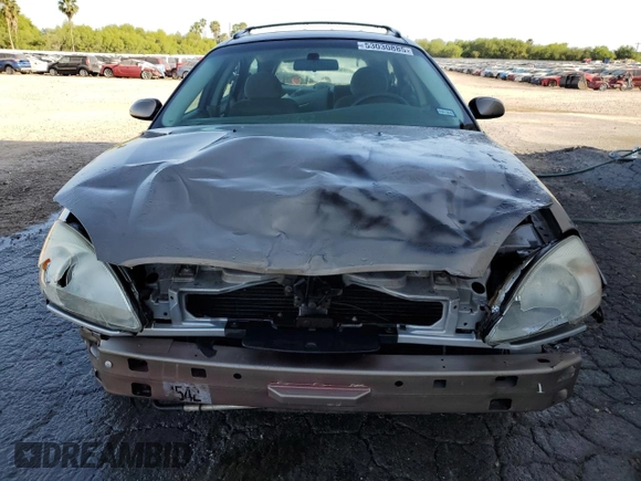 2002 Ford Taurus SE z VIN 1FAFP58S02G278065, wystawiony jako Copart lot #53030885 z przebiegiem 131 984 mil mil oraz Szkoda całkowita • Salvage title. Historia ofert i sprzedaży dostępna na DreamBid. Obrazek 5.