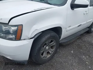 2007 Chevrolet Tahoe LTZ with VIN 1GNFK13007J149042, listed as a IAAI auction lot 42593189 with 216,791 mi miles and . Bid and sale history available at DreamBid. Image 6.