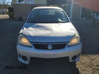 2006 Suzuki Aerio Premium z VIN JS2RC62H965350085, wystawiony jako Copart lot #80517544 z przebiegiem 32 434 mil mil oraz Szkody całkowita. Historia ofert i sprzedaży dostępna na DreamBid. Obrazek 5.
