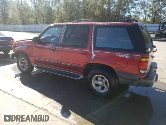1997 Ford Explorer XL with VIN 1FMDU32E8VZC21604, listed as a Copart auction lot 81987654 with 156,141 mi miles and Salvage title. Bid and sale history available at DreamBid. Image 2.