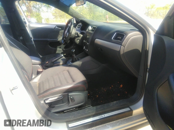 2014 Volkswagen Jetta GLI Autobahn z VIN 3VW5S7AJ4EM396791, wystawiony jako IAAI lot #39648541 z przebiegiem 103 025 mil mil oraz . Historia ofert i sprzedaży dostępna na DreamBid. Obrazek 5.