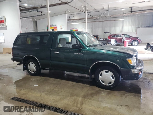 1999 Toyota Tacoma with VIN 4TANL42N4XZ453505, listed as a Copart auction lot 63399325 with 175,198 mi miles and Salvage title. Bid and sale history available at DreamBid. Image 4.
