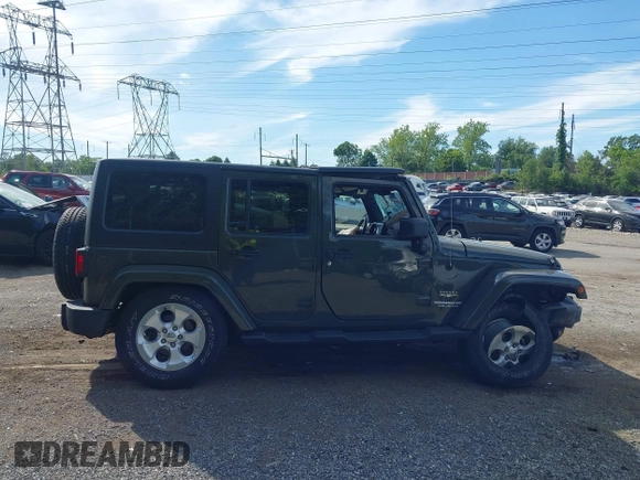 2015 Jeep Wrangler Unlimited Altitude z VIN 1C4HJWEG0FL752152, wystawiony jako IAAI lot #42311043 z przebiegiem 112 379 mil mil oraz . Historia ofert i sprzedaży dostępna na DreamBid. Obrazek 13.